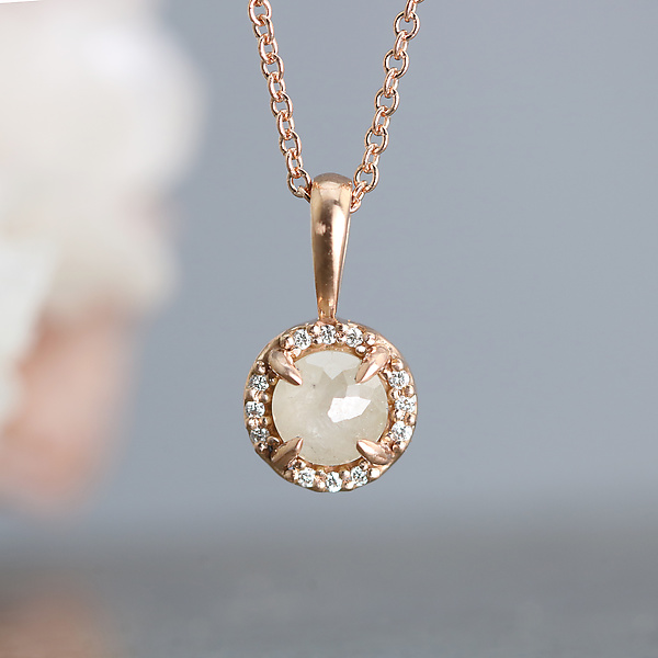 gold necklace with stone pendant